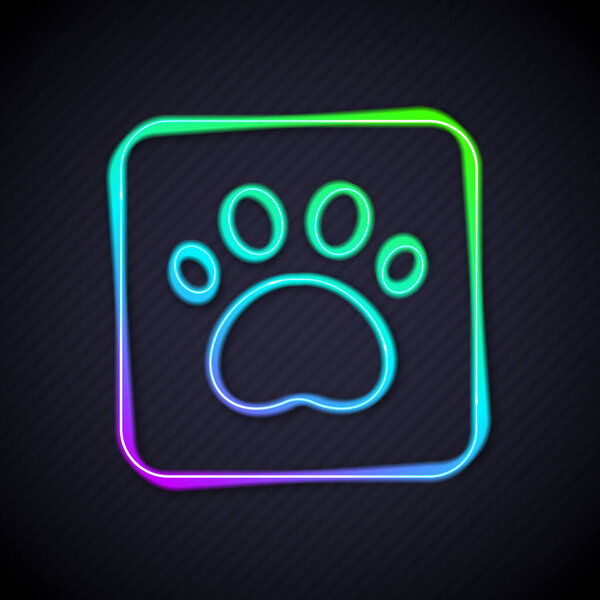 Glowing neon line Paw print icon isolated on black background. Dog or cat paw print. Animal track. Vector