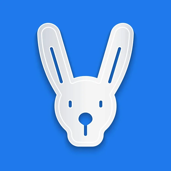 Papier découpé Lapin avec icône oreilles isolé sur fond bleu. Un tour de magie. Concept de divertissement mystérieux. Style art du papier. Vecteur — Image vectorielle