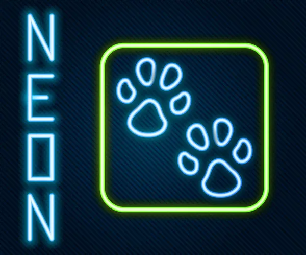 Icono de impresión de pata de línea de neón brillante aislado sobre fondo negro. Huella de pata de perro o gato. Rastreo animal. Concepto de esquema colorido. Vector — Vector de stock