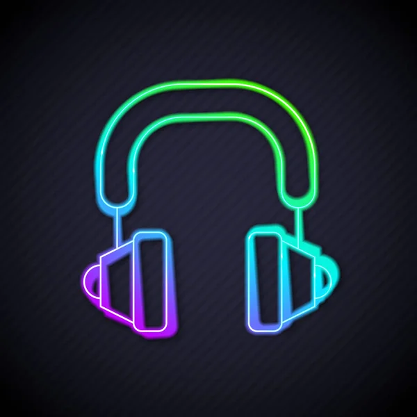 Leuchtende Neon-Line-Kopfhörer-Symbol isoliert auf schwarzem Hintergrund. Kopfhörer. Konzept zum Hören von Musik, Service, Kommunikation und Bedienung. Vektor — Stockvektor