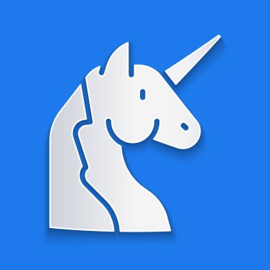 Kağıt kesiği Tekboynuz simgesi mavi arkaplanda izole edildi. Kağıt sanatı tarzı. Vektör.