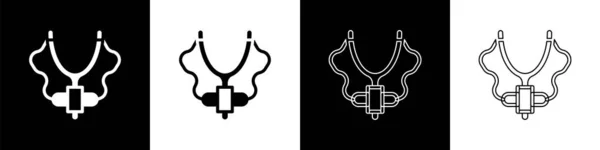 Définissez l'icône Slingshot isolée sur fond noir et blanc. Vecteur — Image vectorielle