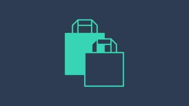 Icona della shopping bag in carta turchese isolata su sfondo blu. Un cartello. Animazione grafica 4K Video motion — Video Stock