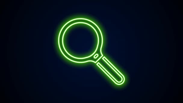 Glowing neon line Magnifying glass icon isolated on black background. Search, focus, zoom, business symbol. 4K Video motion graphic animation — Stock Video
