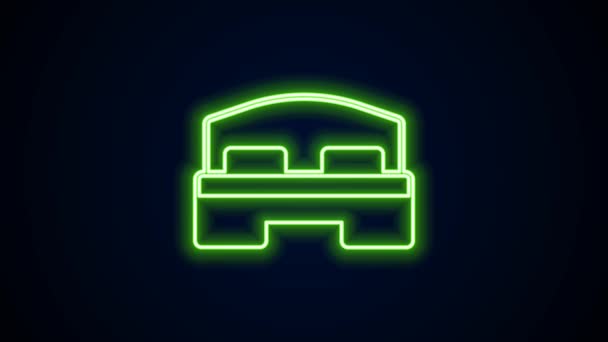 Glowing neon line Hotel room bed icon isolated on black background. 4K Video motion graphic animation — Stock Video