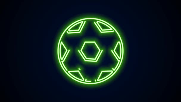 Glowing neon line Soccer football ball icon isolated on black background. Sport equipment. 4K Video motion graphic animation — Stock Video