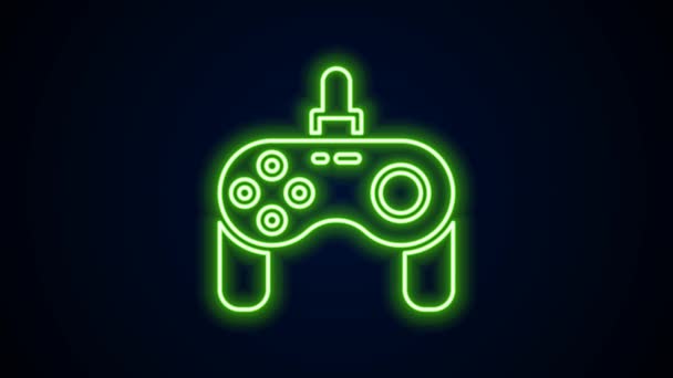 Glowing neon line Gamepad icon isolated on black background. Game controller. 4K Video motion graphic animation — Stock Video