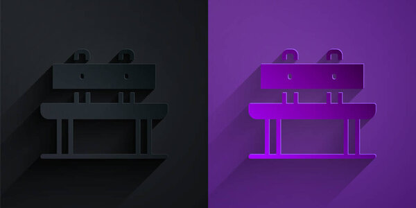 Paper cut Bench icon isolated on black on purple background. Paper art style. Vector