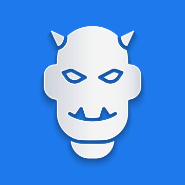 Mavi arka planda izole edilmiş boynuz simgesi olan şeytanın maskesi. Kağıt sanatı tarzı. Vektör