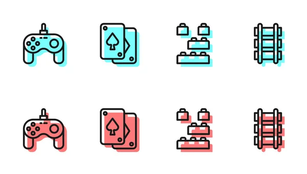 Establecer línea de ladrillos bloque de construcción de juguete, Gamepad, Jugando a las cartas y el icono del ferrocarril. Vector — Vector de stock