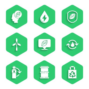 Konumu yaprak, fıçı, kağıt torba geri dönüşümü, temiz su geri dönüşümü, plastik şişe, rüzgar türbini, kalkan ve simgenin içinde insan kafası ile ayarlayın. Vektör