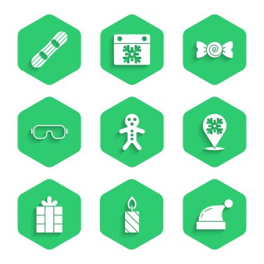 Bayram zencefilli kurabiye, yanan mum, Noel Baba şapkası, kar tanesi, hediye kutusu, kayak gözlüğü, şeker ve kar kayağı ikonu. Vektör