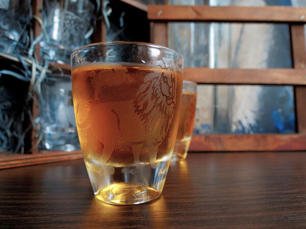Cognac in etched glass on the table