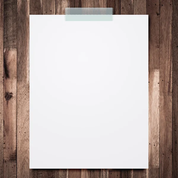 Empty white paper sheet stick on wood texture background. — Stock Photo, Image