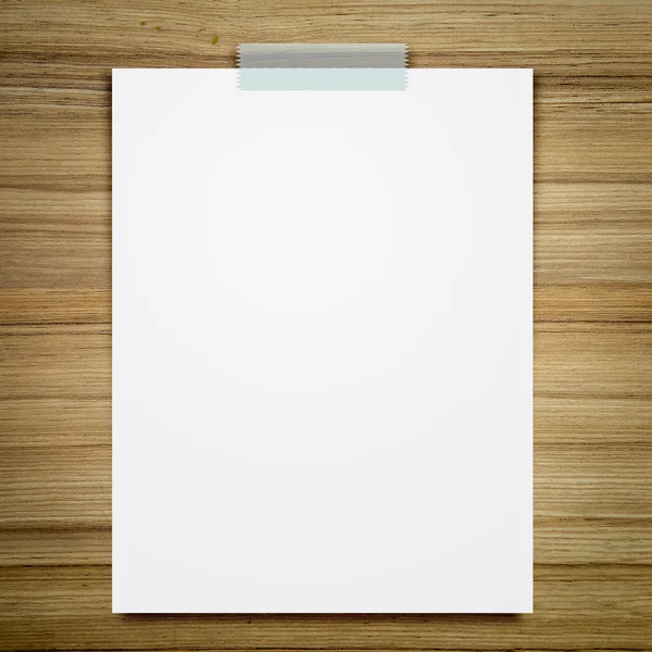 Empty white paper sheet stick on wood background. — Stock Photo, Image