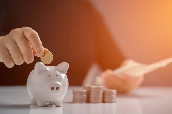 Hand Putting Coin Piggy Bank Counting Financial Expenses According Home — Stock Photo, Image