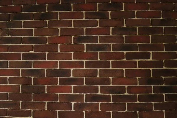 decorative brick wall, red brick and white stripes