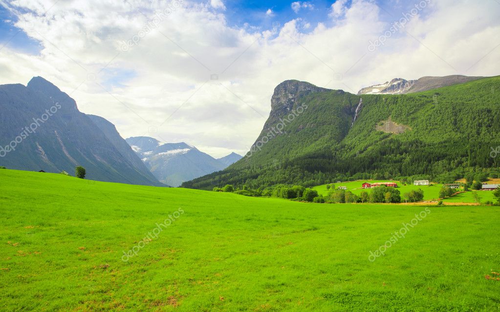 Green meadows and high mountains
