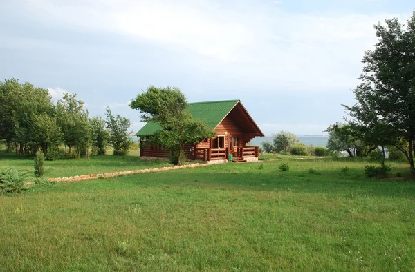 Wooden cottage — Stock Photo, Image