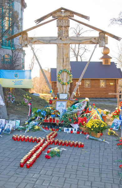 KIEV (KYIV), UKRAINE - November 21, 2014:Celebrating the first anniversary of the Maidan in Kiev. Memorial cross near the place of killing "heavenly hundred" at February 20, 2014