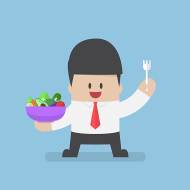 Sebze salata kasesi ve çatal tutan işadamı elinde