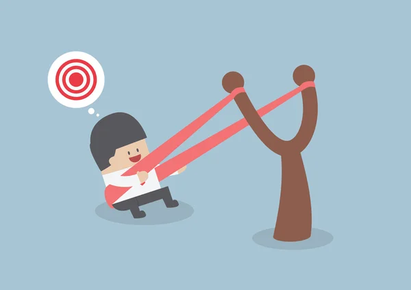 İşadamı bir sapan hedefe başlatmak için hazır