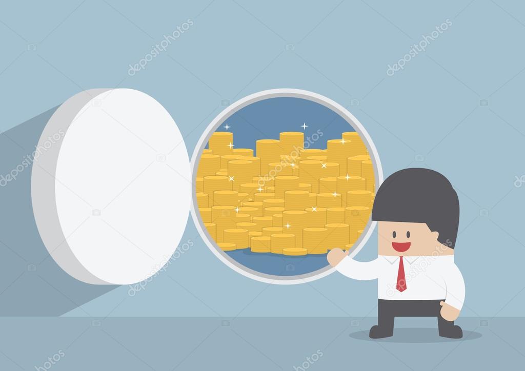 Businessman and opened vault door with gold coins