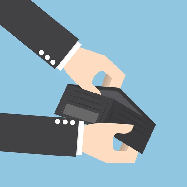 Boş bir cüzdan tutan işadamı