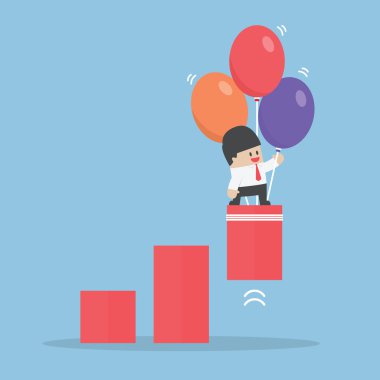 İşadamı grafik çekti için balon kullanın