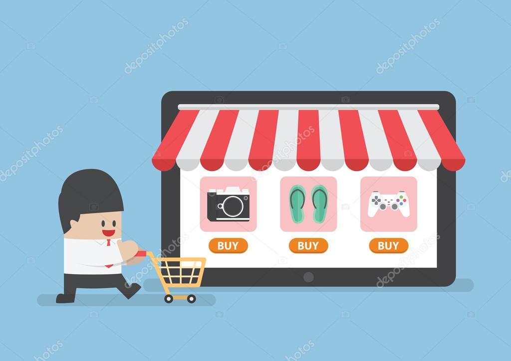 Businessman with shopping cart in front of online store