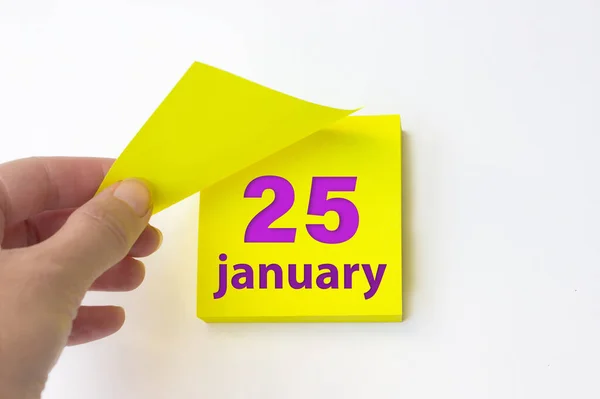 January 25Th Day Month Calendar Date Hand Rips Yellow Sheet —  Fotos de Stock