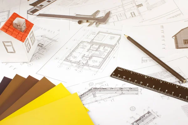 Real estate, building, construction, architecture concept. Architectural Materials Tools And Blueprints. Construction plan tools.