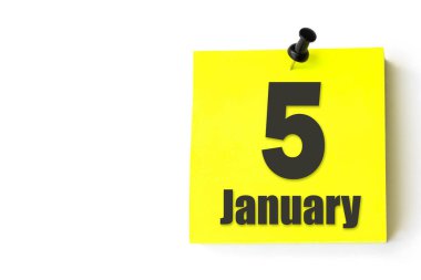 5 Ocak. Ayın 5 'i, takvim tarihi. Takvimin sarı sayfası. Kış ayı, yılın günü konsepti.