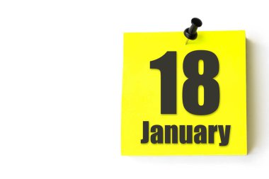 18 Ocak. Ayın 18 'i, takvim tarihi. Takvimin sarı sayfası. Kış ayı, yılın günü konsepti.