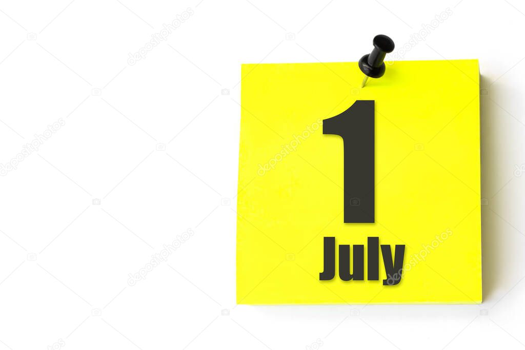 July 1st . Day 1 of month, Calendar date. Yellow sheet of the calendar. Summer month, day of the year concept