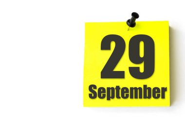29 Eylül. Ayın 29 'u, takvim tarihi. Takvimin sarı sayfası. Sonbahar ayı, yılın günü konsepti.