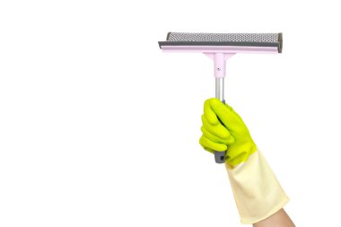 Spring cleaning concept. Washing windows theme. Hand holding a pink scraper windows isolated on a white background. Housework concept.