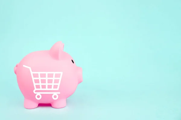 Pink Piggy Bank Mini Shopping Cart Blue Background Saving Money — 스톡 사진
