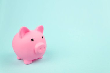 Saving concept theme with a pink piggy bank. Money saving for future