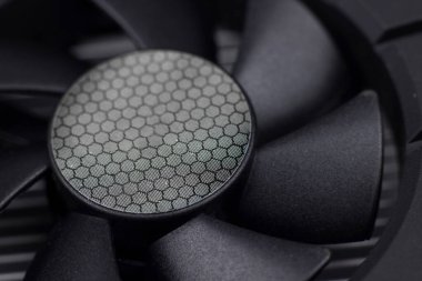 Part of modern black computer video card with cooler. GPU card. IT hardware