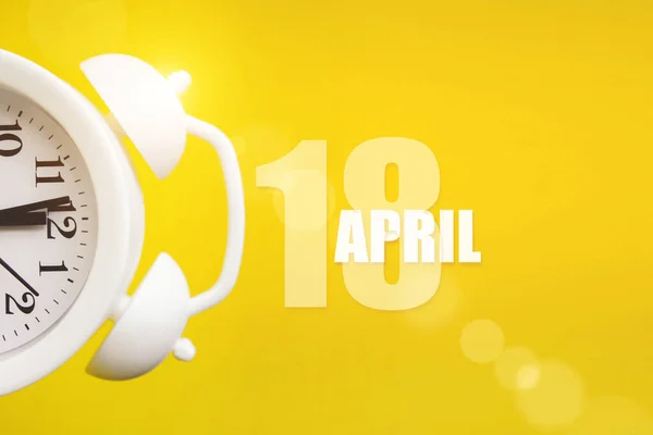 April 18Th Day Month Calendar Date White Alarm Clock Yellow — Stock Photo, Image