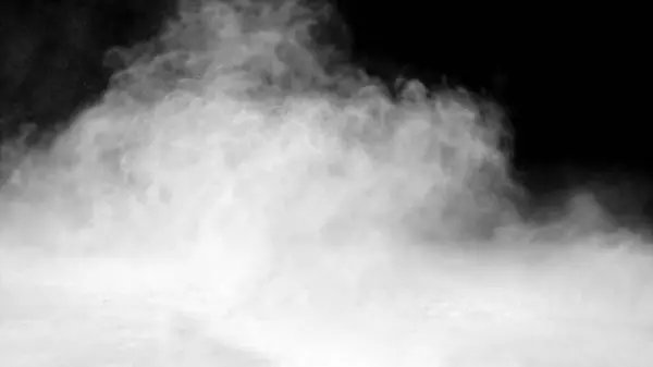 Dust particles in motion against a black background. Dust cloud.