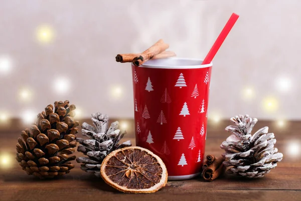 Red Cup Hot Drink New Year Decor Brown Wooden Background — стоковое фото