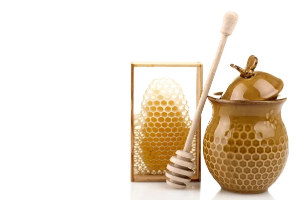 Honeypot és kanál méz, méz fésű közelében — Stock Fotó