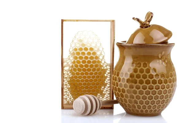 Honeypot és kanál méz, méz fésű közelében — Stock Fotó