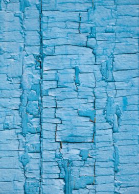 Kırık mavi yağlı boyalı eski ahşap yüzey.