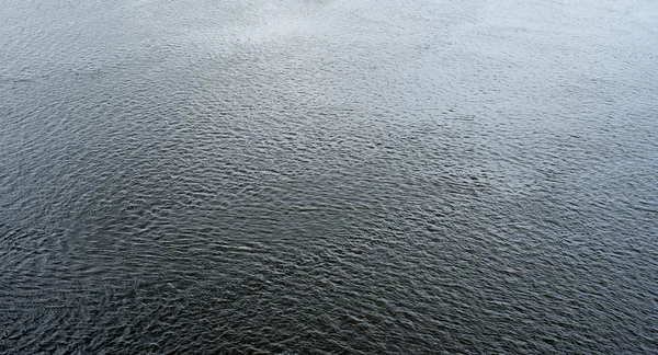 Superficie de agua fría y profunda con ondas —  Fotos de Stock