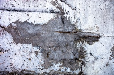 Çimento harcı ile parçalanmış gri beton yüzey