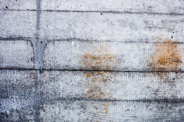 Pared de hormigón gris con rastros endurecidos de los moldes de obturación —  Fotos de Stock