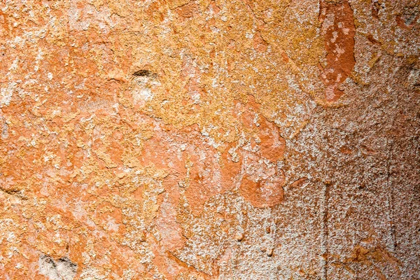Betonový povrch se zbytky oranžovou barvou a vápno — Stock fotografie